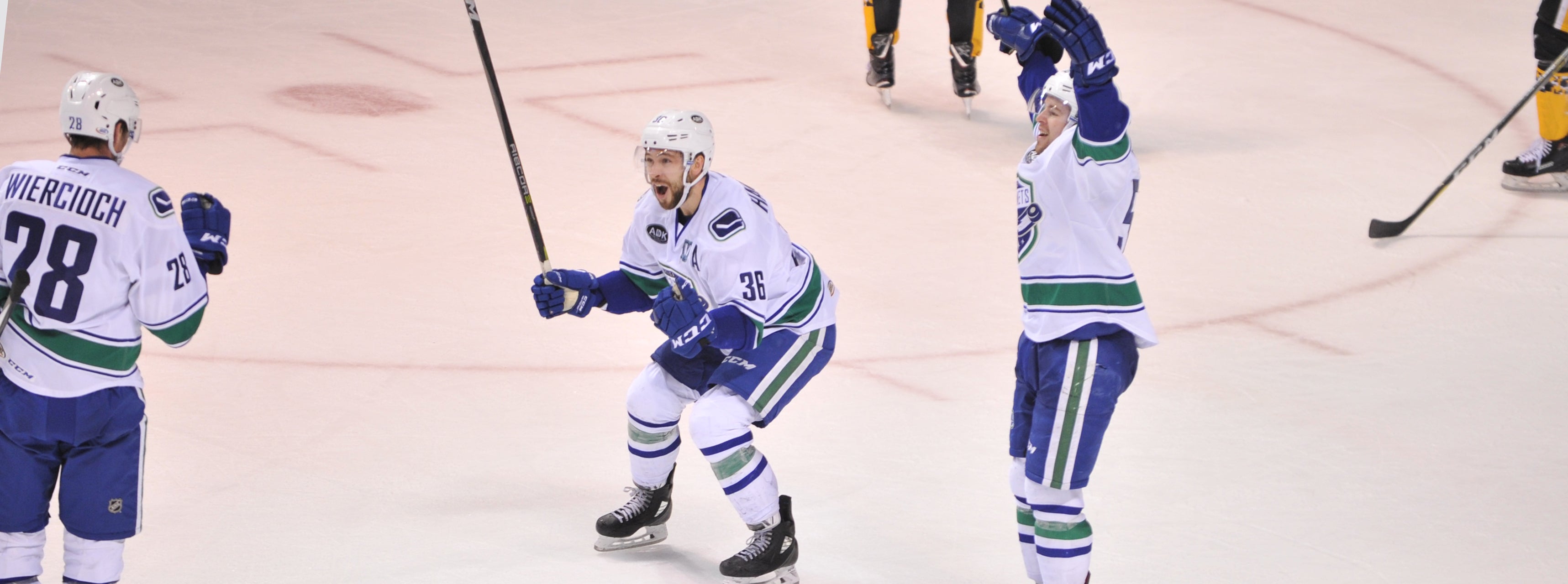 COMETS FREEZE PENGUINS IN OVERTIME IN WILD AFFAIR