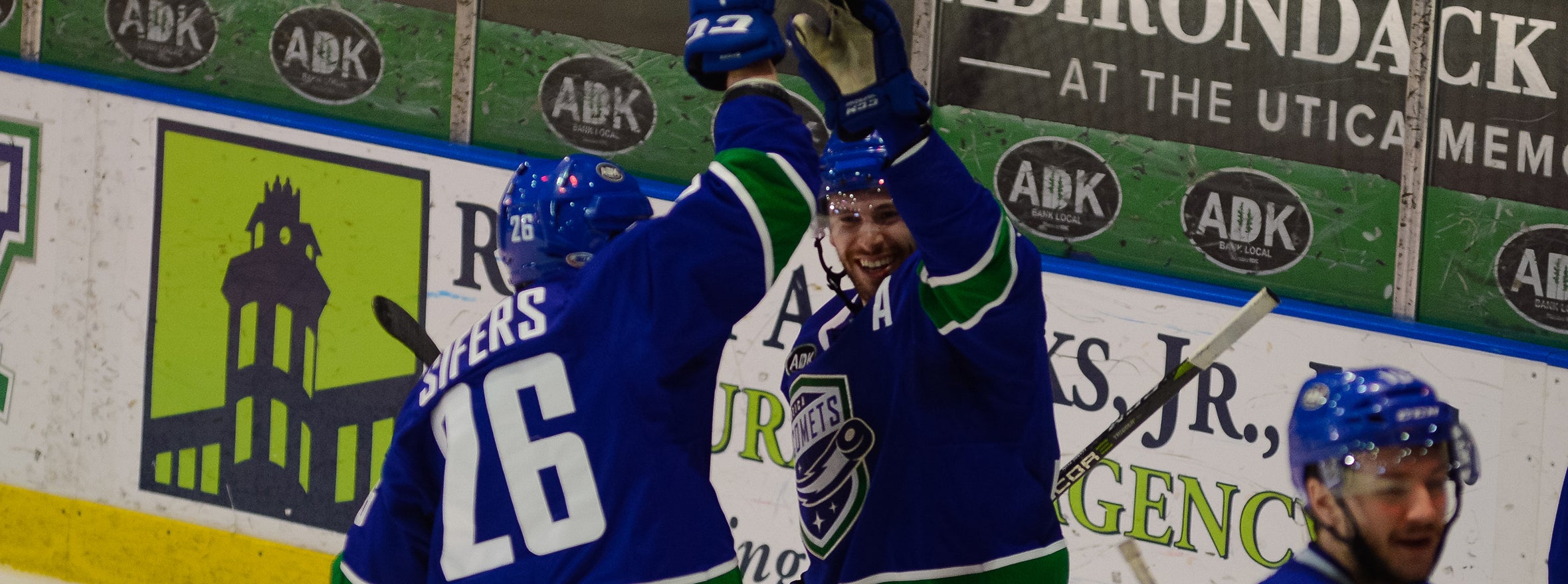 COMETS SURVIVE PENGUINS IN OVERTIME