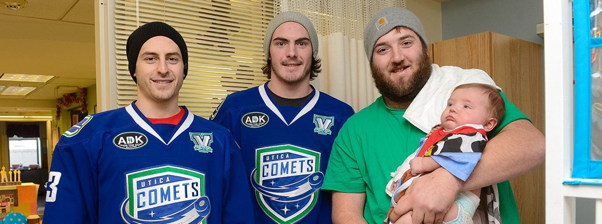 COMETS DELIVER HOLIDAY CHEER TO PEDIATRIC PATIENTS