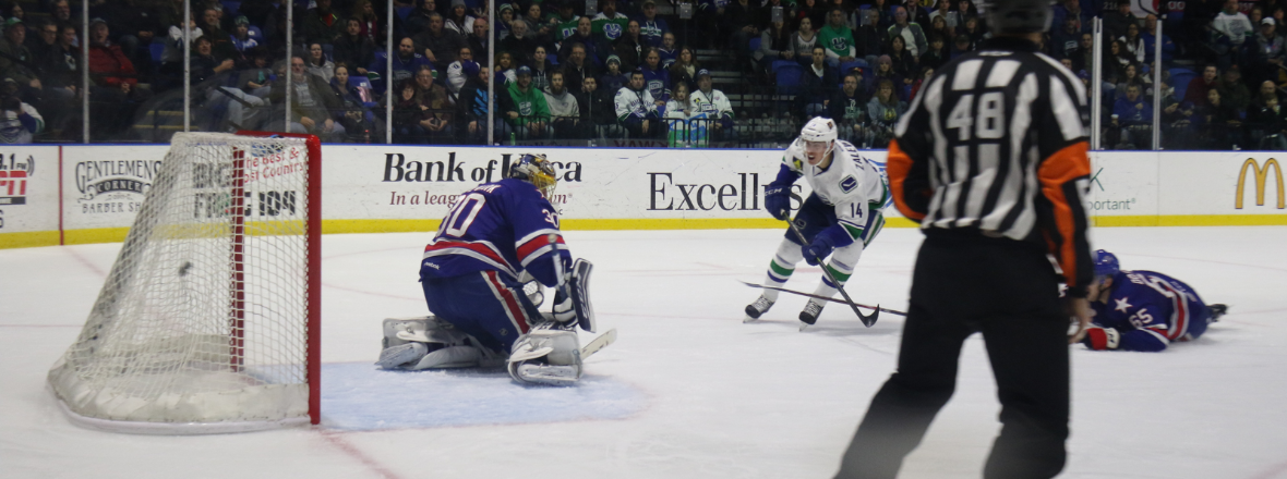 Canucks Send Four to Comets