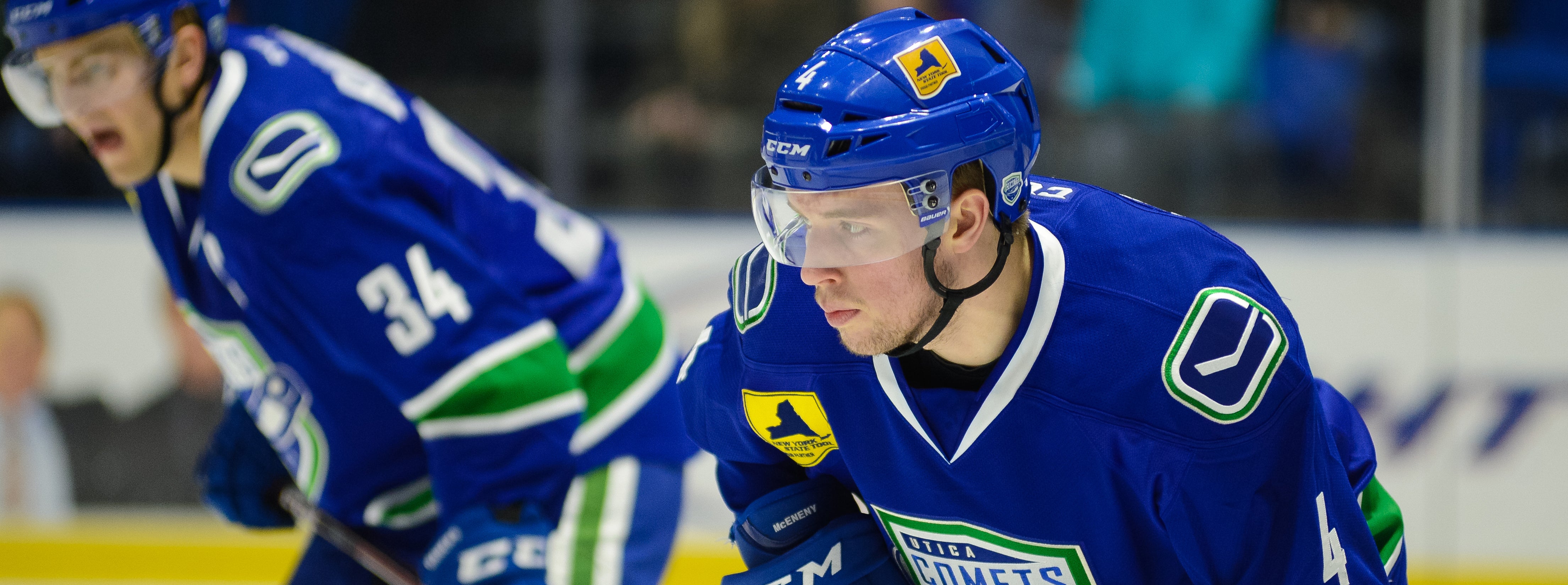 CANUCKS RE-SIGN DEFENSEMAN EVAN MCENENY