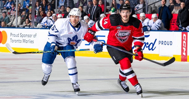 HOCKEY TOWN: Blues alum outlast Hawks 8-7 as Winter Classic begins