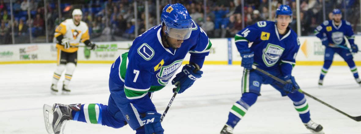 CANUCKS RECALL LABATE AND SUBBAN, COMETS SIGN WALL