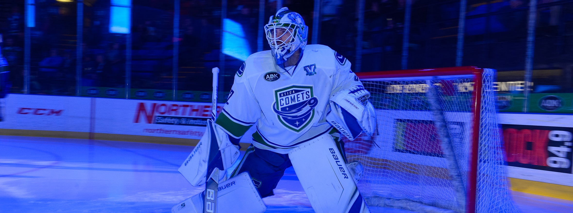 CANUCKS RECALL BACHMAN, COMETS RECALL GARTEIG