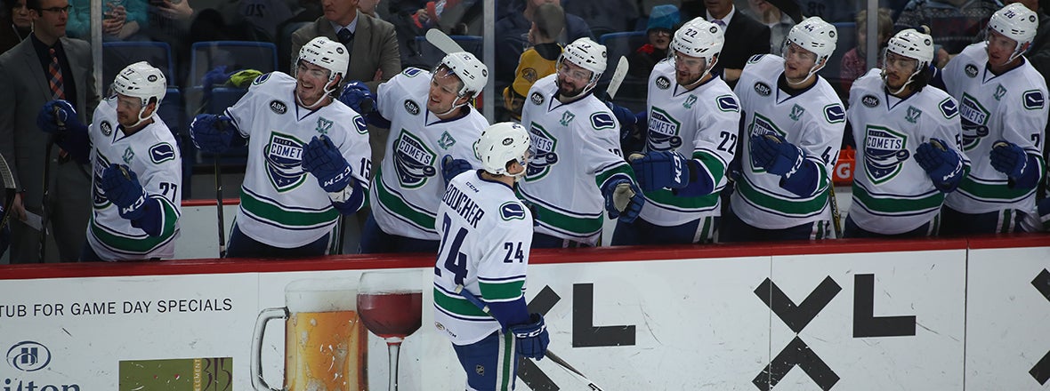 BOUCHER, BACHMAN POWER COMETS TO WIN OVER WOLF PACK