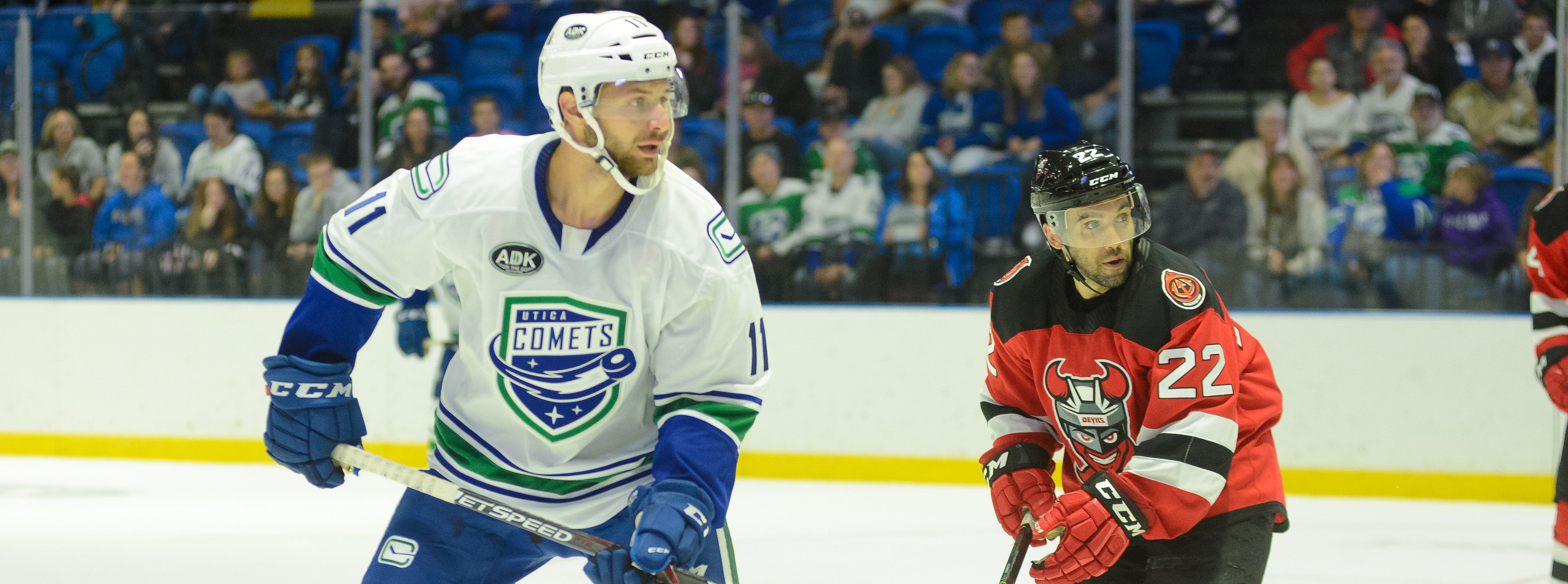 COMETS REDUCE PRESEASON ROSTER BY NINE